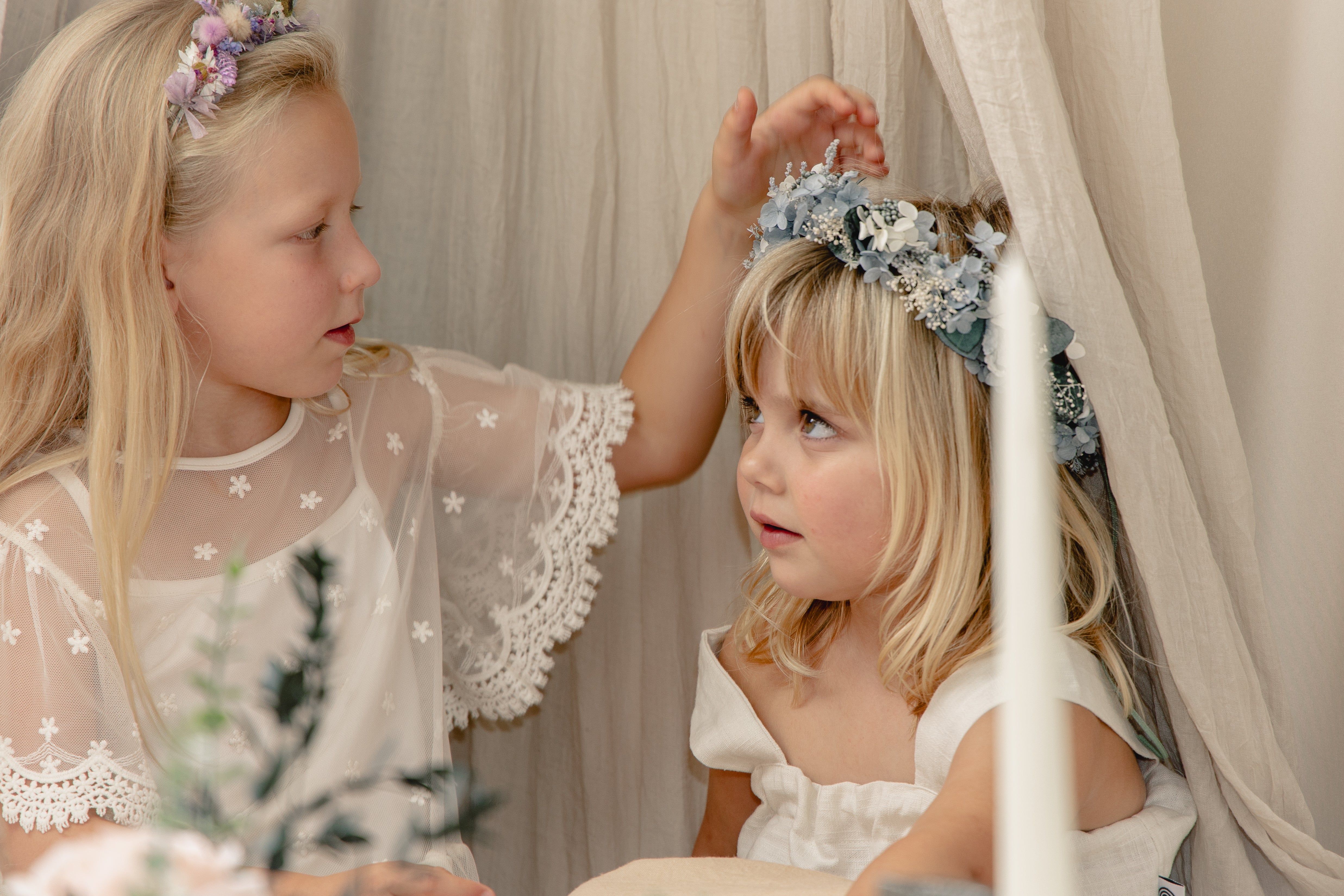 Make this hairstyle a standout. Little flower girl wear hair tiara. Page  boy with blonde hairstyle hold wedding bunch. Little children ready for  Stock Photo - Alamy
